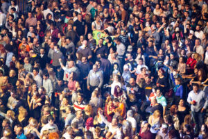 A large crowd of people enjoying a concert