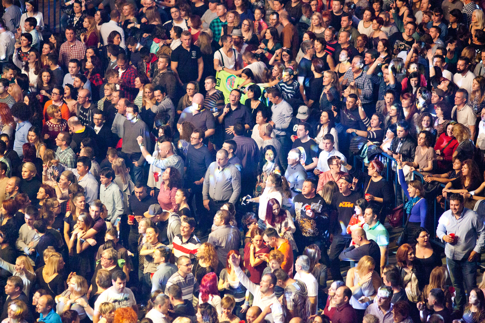 A large crowd of people enjoying a concert